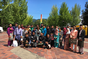 Participants and faculty members in their national costumes