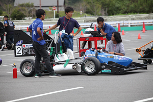 Team members waiting for the competition to begin