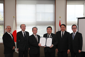 Group photo after the signing ceremony